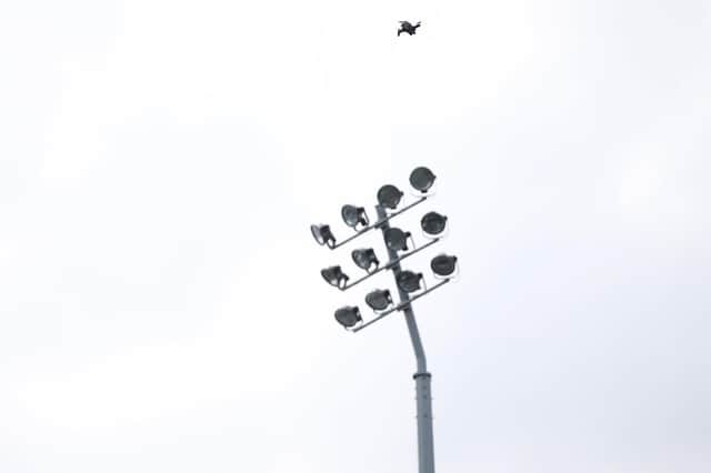 The drone spotted flying above the floodlights at Mansfield Town's match last night. (PHOTO BY: Craig Brough/AHPIX LTD)