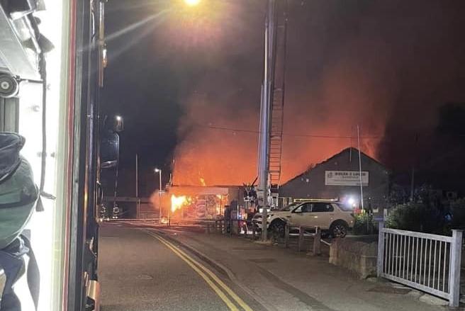 Flames can be seen at the supermarket.