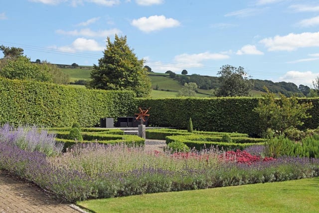 The six acre grounds contains a knot garden.
