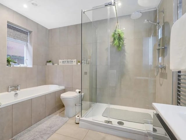 The stylish family bathroom has been finished to a high standard with a range of modern fixtures and fittings.