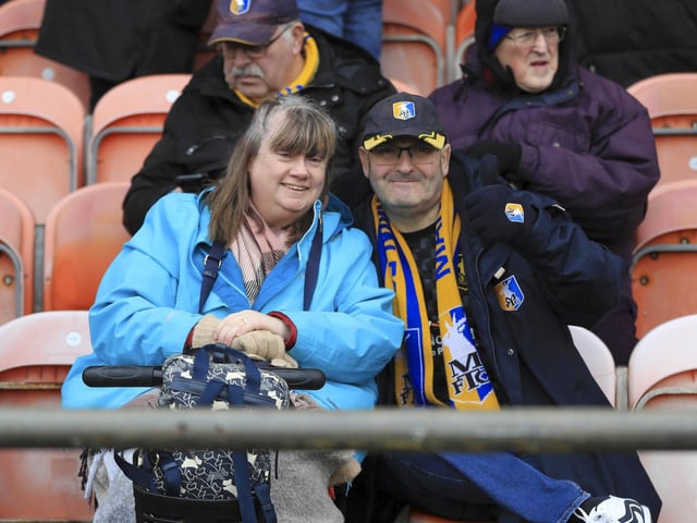 Mansfield Town ended a run of seven straight defeats with a draw at Blackpool.