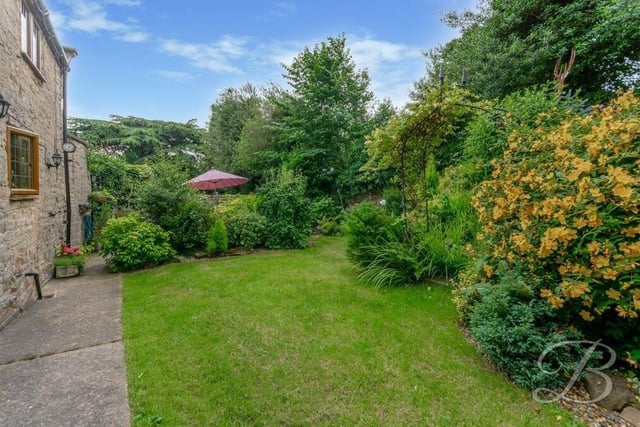 The property sits on an incredible countryside plot that enhances its charm.