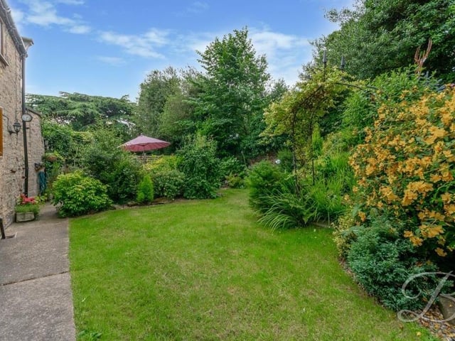 The property sits on an incredible countryside plot that enhances its charm.