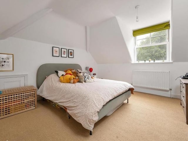 Another bright and super-sized bedroom on the second floor. This one overlooks the back garden.