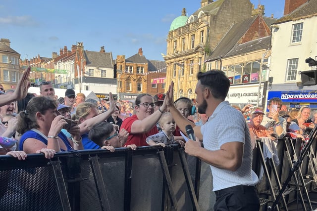 Singer Gareth Gates interacting with the crowd in Mansfield Market Place.