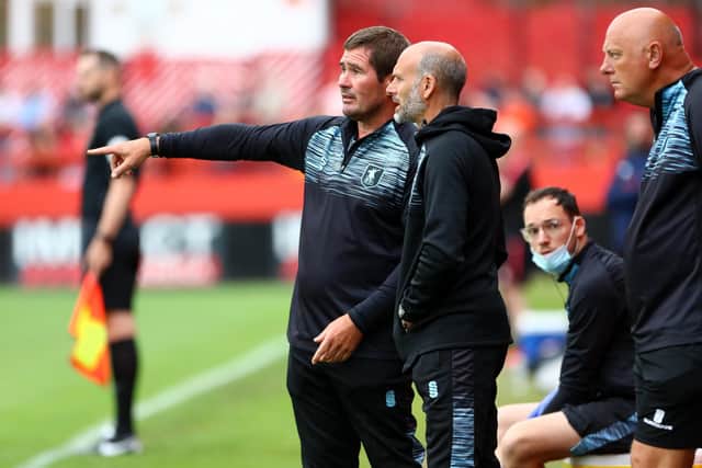 Mansfield Town's coaching staff - making sure they are covered in all departments for the season ahead.