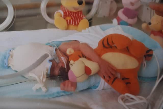 Tiny Kieron in the neo-natal intensive care unit of the former Jessops Hospital for Women in Sheffield, with a Tigger toy.