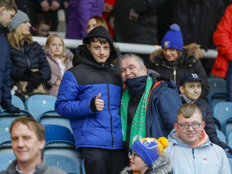 Mansfield Town fans watch the brilliant win at Peterborough United.