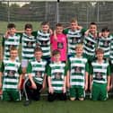 Members of the Priory Celtic FC under 13 boys team in their new kits.
