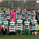 Members of the Priory Celtic FC under 13 boys team in their new kits.