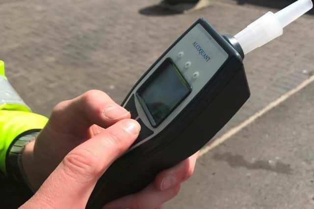 He was pulled over by the police and breathalysed.