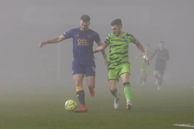 MIssing striker Rhys Oates in action at the original abandoned game.