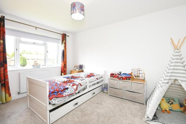 The third bedroom at the Langwith property is currently being used for a young child. Facing the front garden, it is so spacious there is even room for a tent!
