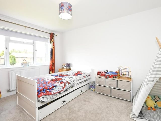 The third bedroom at the Langwith property is currently being used for a young child. Facing the front garden, it is so spacious there is even room for a tent!