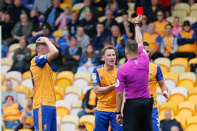 Referee Paul Howard gives Mansfield Town midfielder Stephen Quinn his marching orders - Pic Chris Holloway