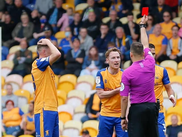 Referee Paul Howard gives Mansfield Town midfielder Stephen Quinn his marching orders - Pic Chris Holloway