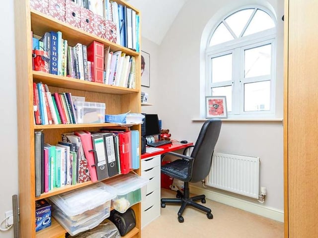 As you can see, the smallest of the four bedrooms can easily be converted into a home office. The arched window overlooking the front of the £290,000 property is a nice, quirky touch.