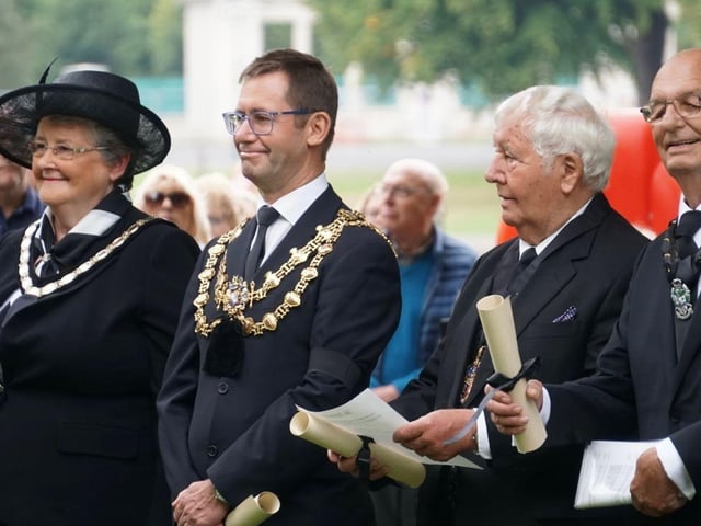Andy Abrahams, Mansfield mayor, second from left, was among those in attendance.