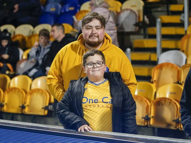Mansfield Town fans watching the draw with Wrexham.