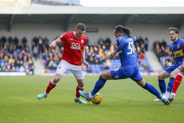 Ollie Clarke on the ball during the Sky Bet League 2 match against AFC Wimbledon at Cherry Red Records Stadium, 27 Jan 2024 
Photo Chris & Jeanette Holloway / The Bigger Picture.media