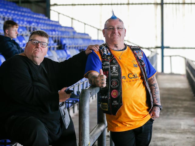 Mansfield Town fans enjoy the 3-0 win at Oldham Athletic.