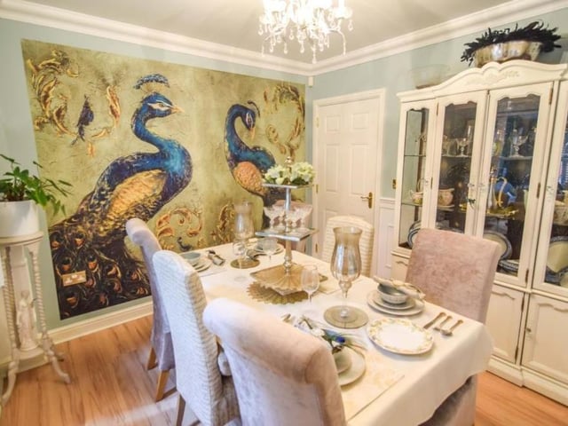 The delightful dining room has a touch of class and elegance, don't you think?