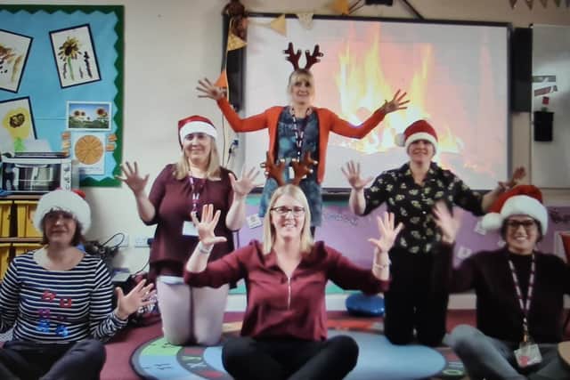 Staff performed a routine to 'Rockin' around the Christmas tree'