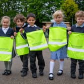 The pupils at St Mary's C of E Primary School with their new kit bags donated by David Wilson Homes