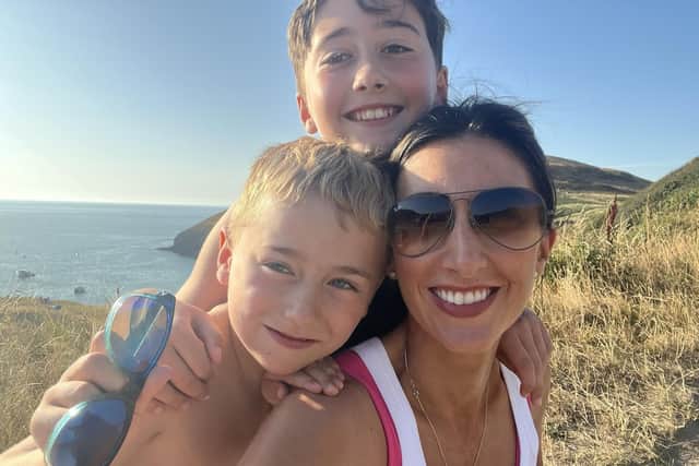 George with mum Caroline and his big brother.