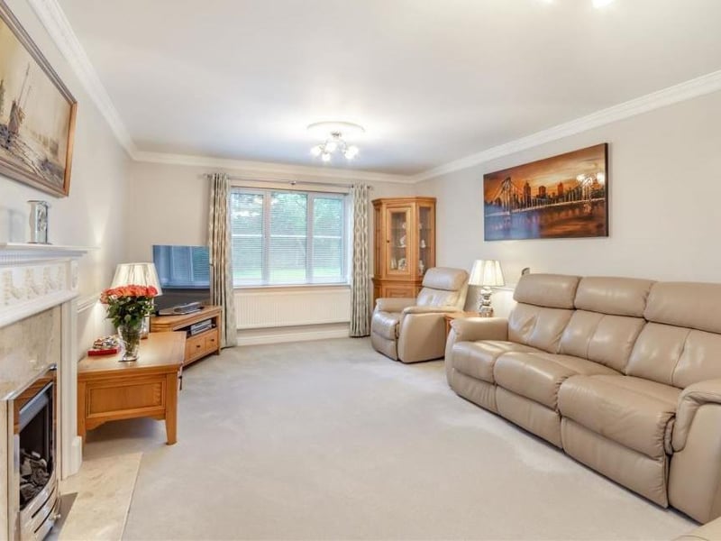 One of the highlights of the bright and roomy lounge is a marble fireplace with inset coal-effect gas fire and surround.
