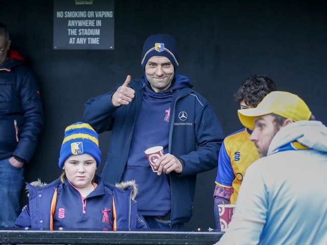 Mansfield fans at The EnviroVent Stadium for the match against Harrogate Town.