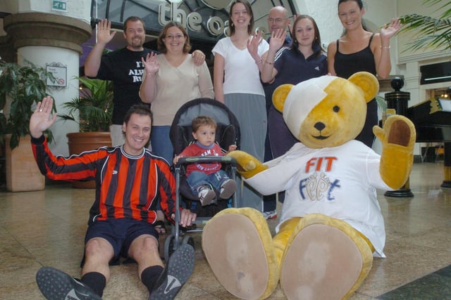 Pictured at the Meadowhall shopping centre, where  Theo the Bear and some fit friends of his met up with  Elliot Wilson age 18 months and his mum and dad Alistair and Sally to launch the  Fit Feet mall walk that will take place Sunday 2nd October to raise cash for the Sheffield Childrens Hospital.