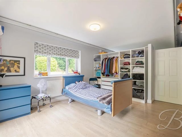 One of five spacious bedrooms in the property