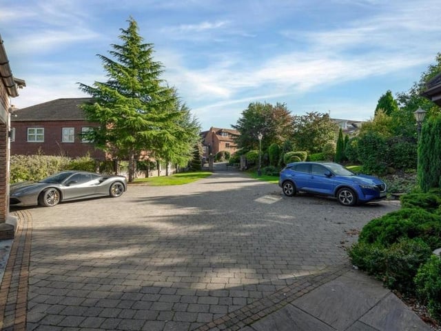 The block-paved driveway at the front of the £975,000 house offers ample space for off-street parking.