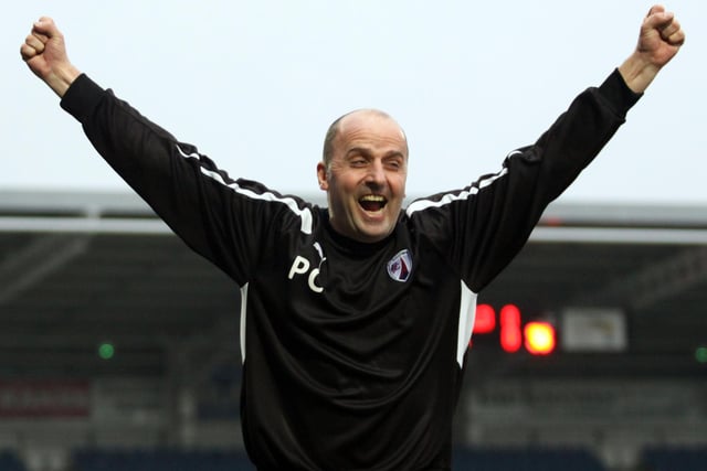 Paul Cook celebrates a Chesterfield goal in a 2-0 win over AFC Wimbledon in February 2013. Goals would be a common theme for Spireites, who scored 60 goals that season, before finishing the following year as the division's top scorers.