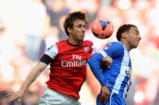 Nacho Monreal and James Perch compete for the ball during the FA Cup Semi-Final match between Wigan Athletic and Arsenal in 2014. (Photo by Mike Hewitt/Getty Images)