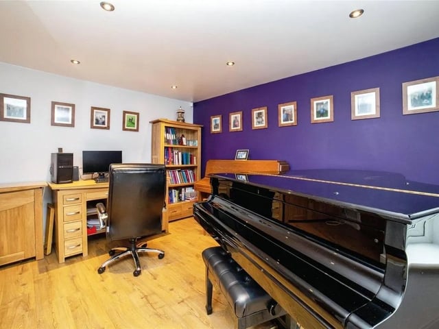 The additional reception room is a bright and versatile space featuring a large front– facing window that allows plenty of natural light to fill the room.