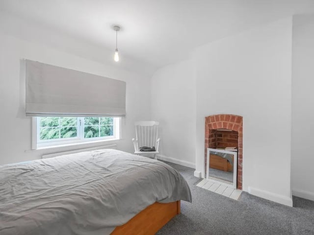 One of three bedrooms in the spacious family home.
