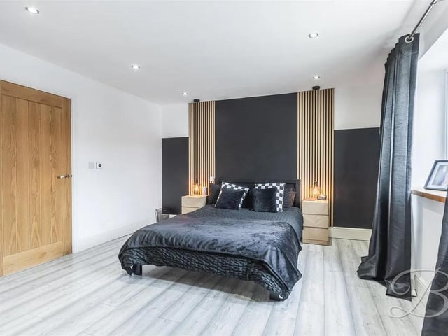 One of four spacious bedrooms in the property.