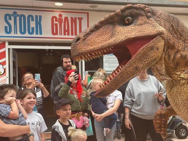 Crowds gather for a glimpse of one of the Jurassic visitors.