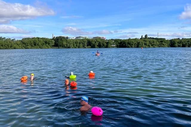 Swimmers take to the course at Kings Mill Reservoir.
