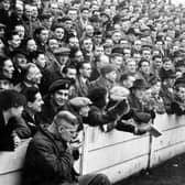Mansfield Town fans pack into Field Mill during an FA Cup tie in 1953 with Nottingham Forest. It saw a record crowd of 24,467 set.