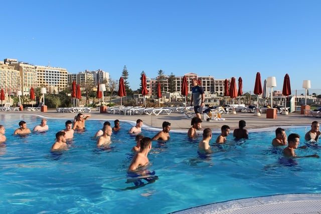 Stags players enjoy a swimming pool-based session in Malta in 2017.