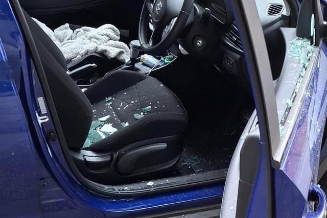 Lisa shared an image of her car following the robbery.