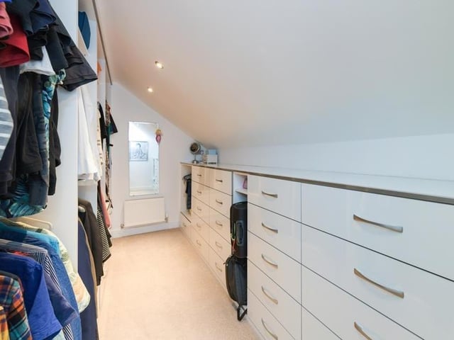 A unique feature of the main bedroom is this separate dressing room.