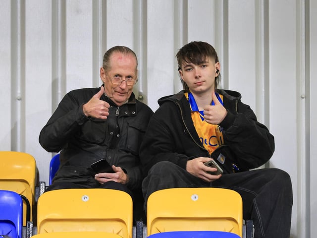 Travelling Mansfield Town fans during the Sky Bet League One match against AFC Wimbledon at Stadium Plough Lane.