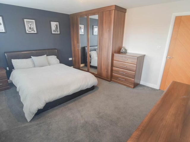 Two of the five bedrooms at the Forest Town property include fitted wardrobes, including this smart one.