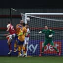 William Boyle celebrates hitting the winner for Cheltenham Town. (Photo by Eddie Keogh/Getty Images)