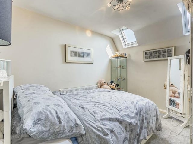 The fourth and final bedroom is more compact than the others but still a good-sized double. Featuring double Velux windows, it has a carpeted floor.