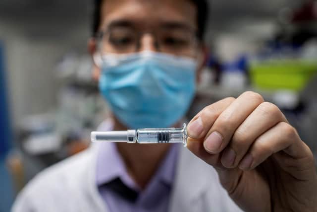 Vaccine roll-out to protect people against Covid-19. Photo by Nicolas Asfouri/Getty Images.